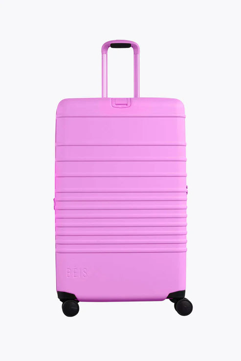 Away suitcase purple sales