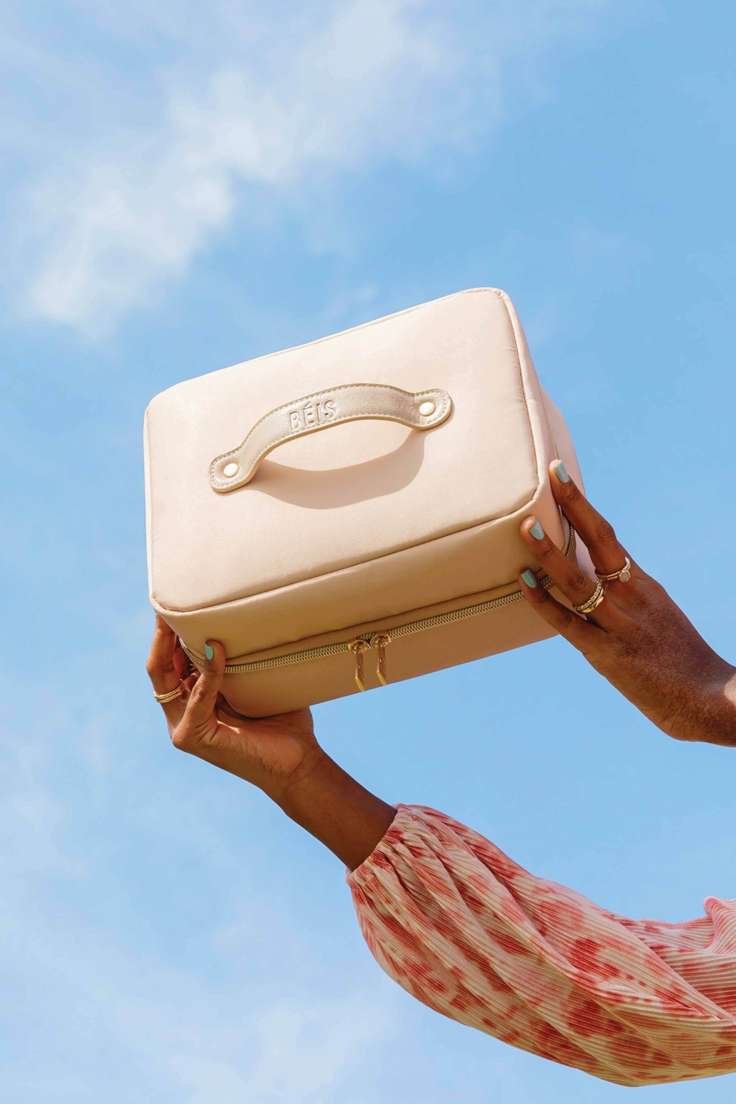 hanging cosmetic case with blue skies background
