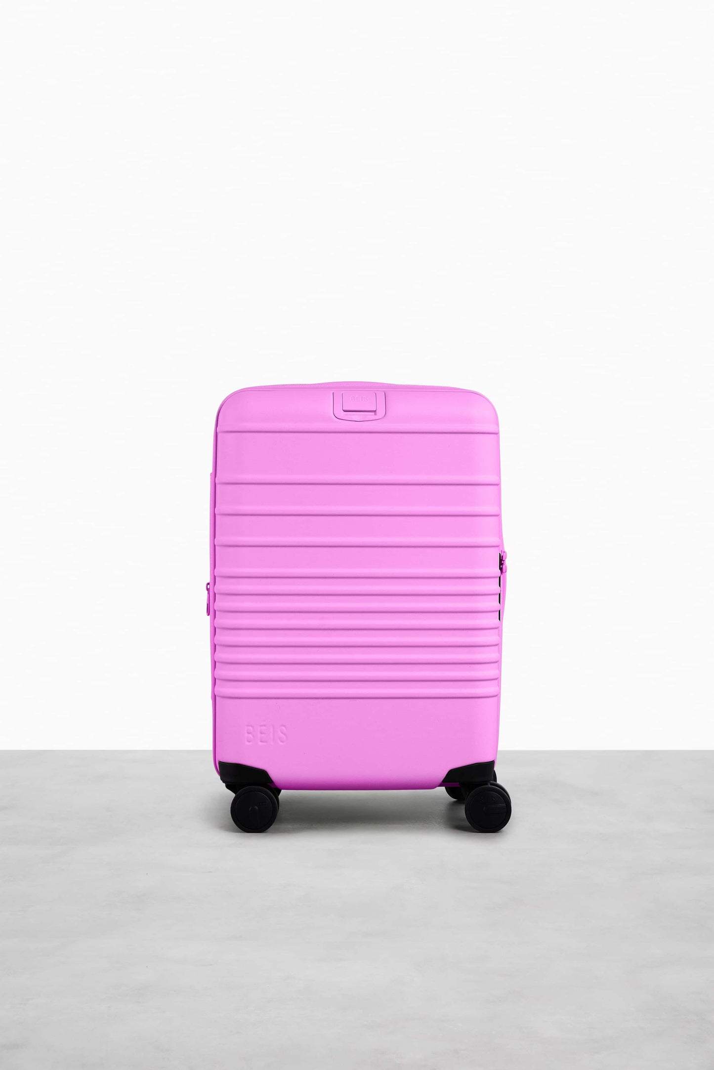 The Carry-On Roller in Berry