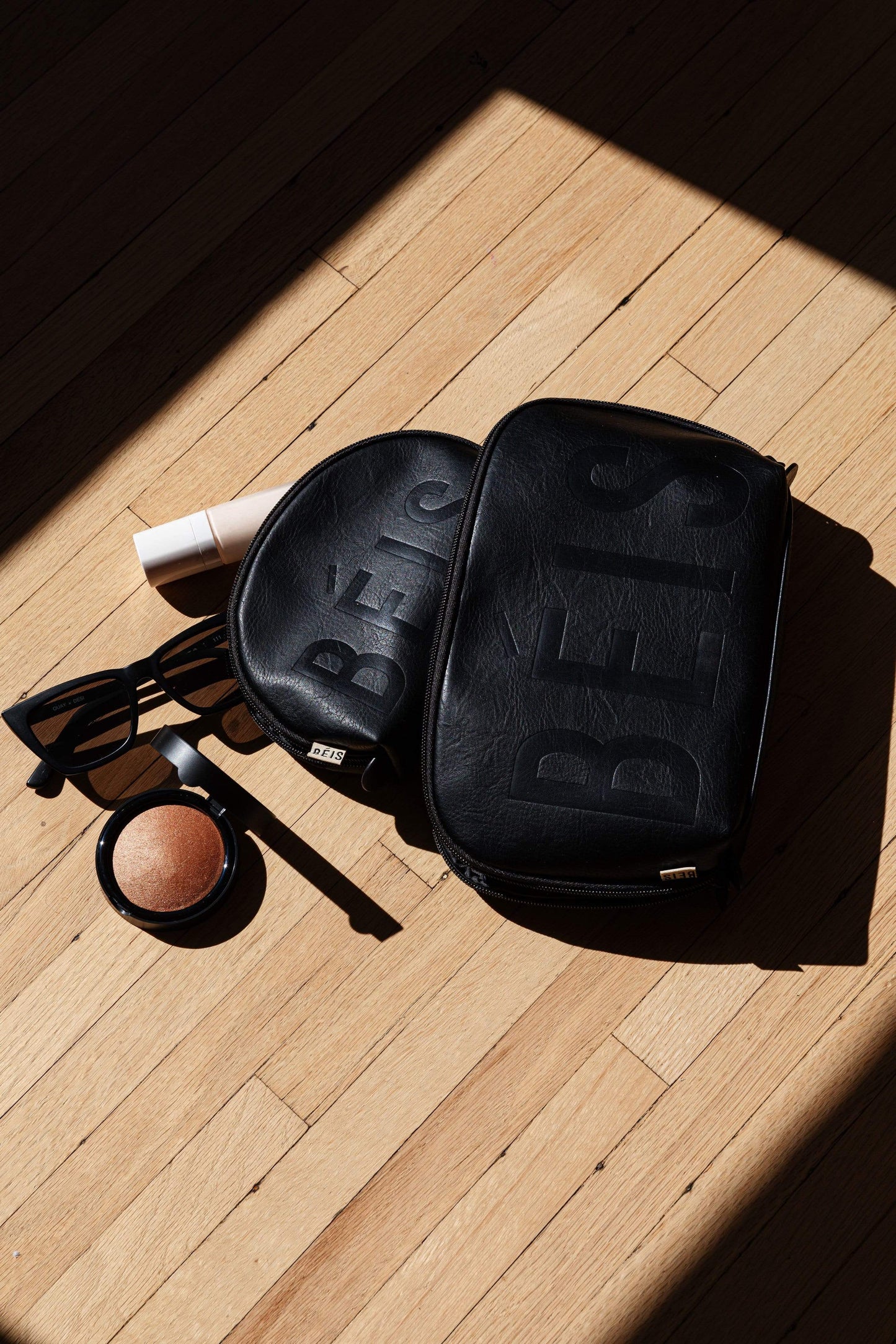 Cosmetic Pouch Set Black Front Shadow Lifestyle Shot