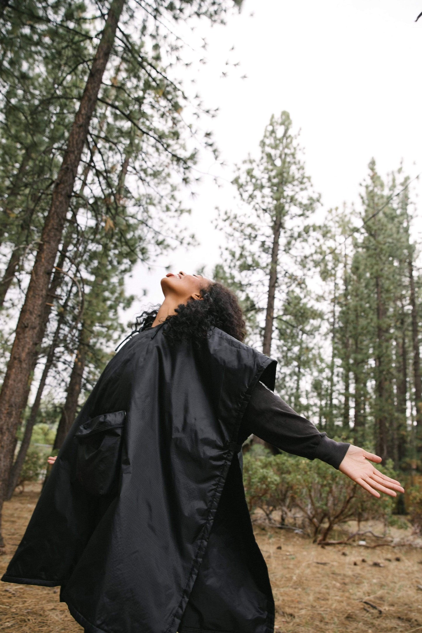 Packable Poncho Black Camping Woods Lifestyle
