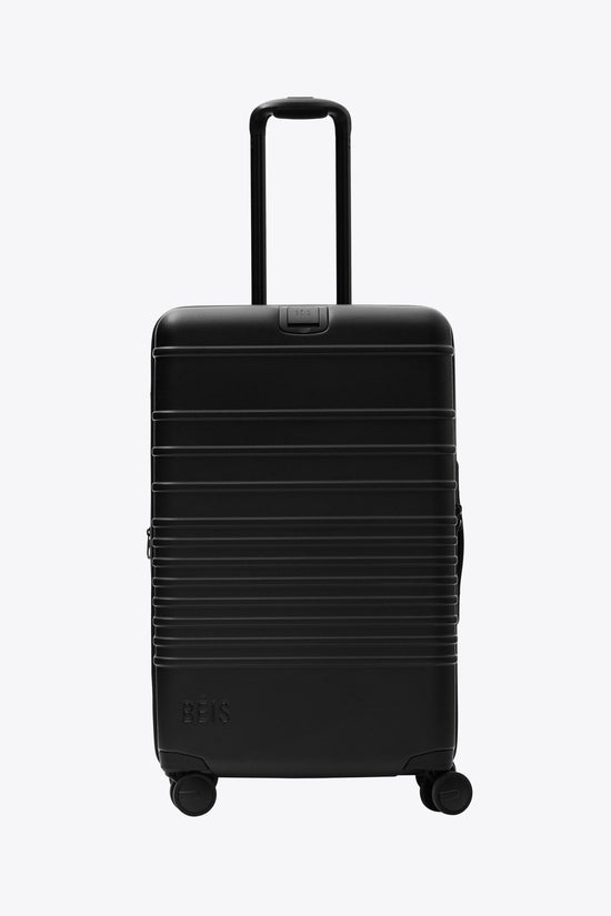 The Medium Check-In Roller in All Black