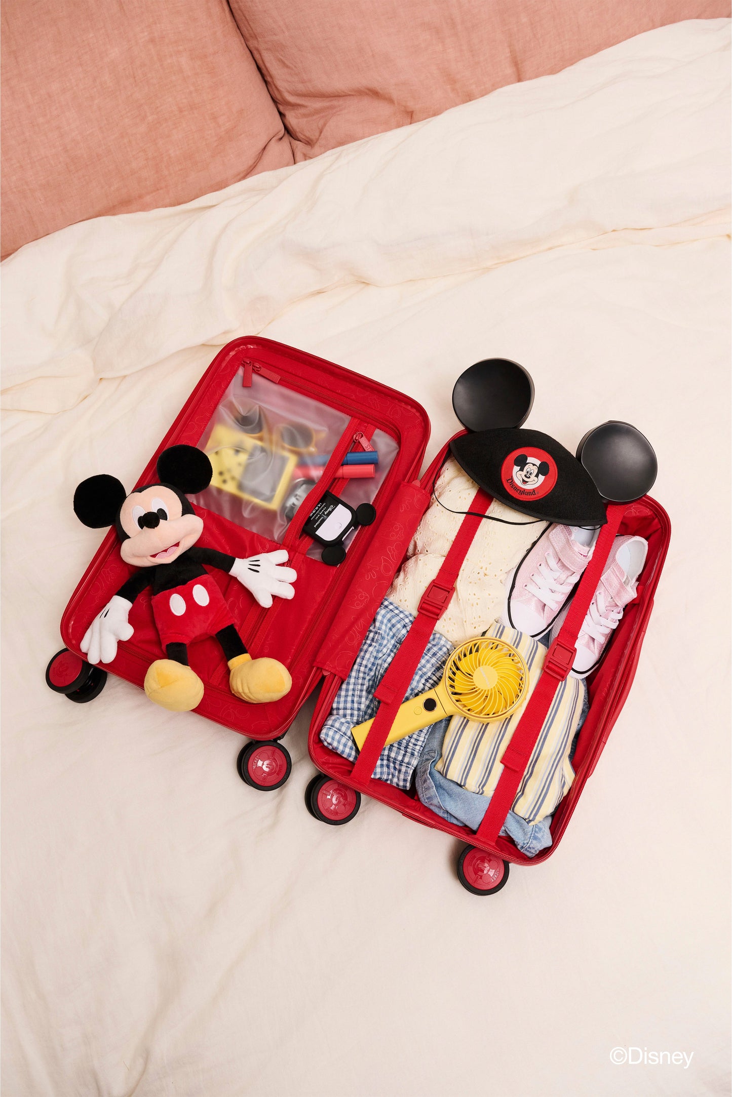The Disney Small Carry-On Roller in Mickey Mouse Red