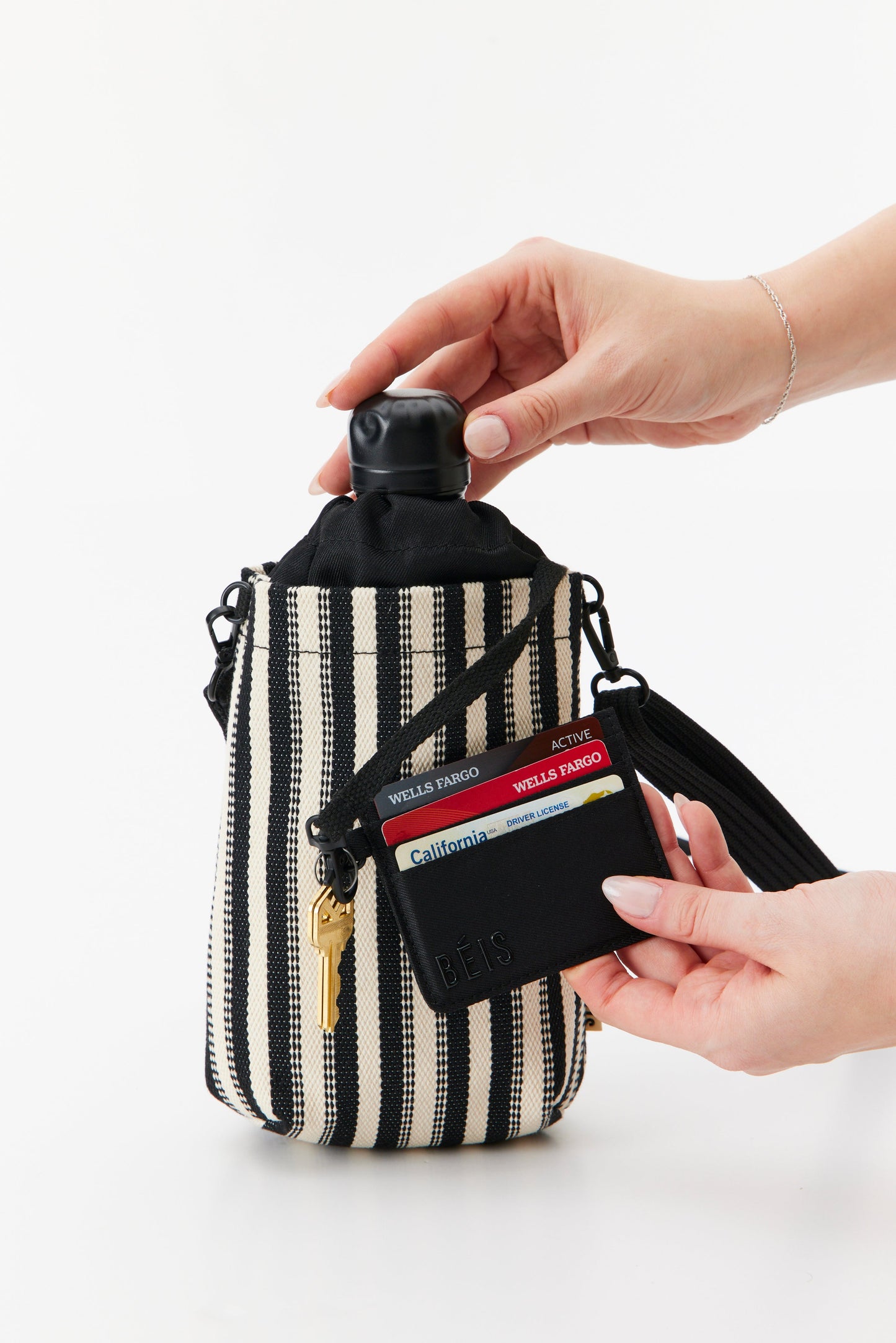 The Water Bottle Crossbody in Black Stripe