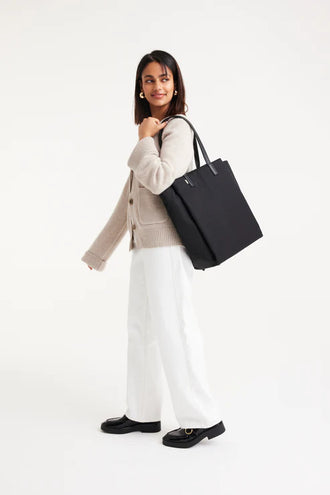 The Commuter Tote In Black on model