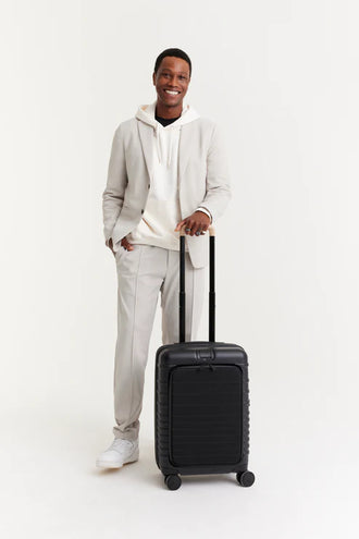 The Front Pocket Carry-On In Black on model