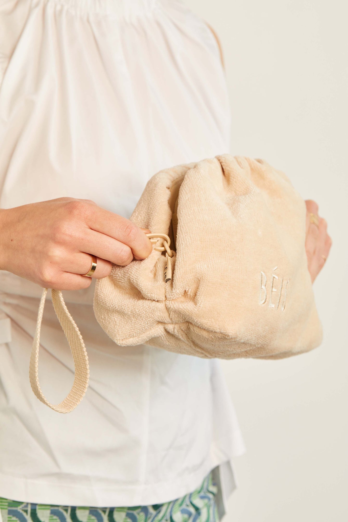 The Terry Cosmetic Clutch in Beige