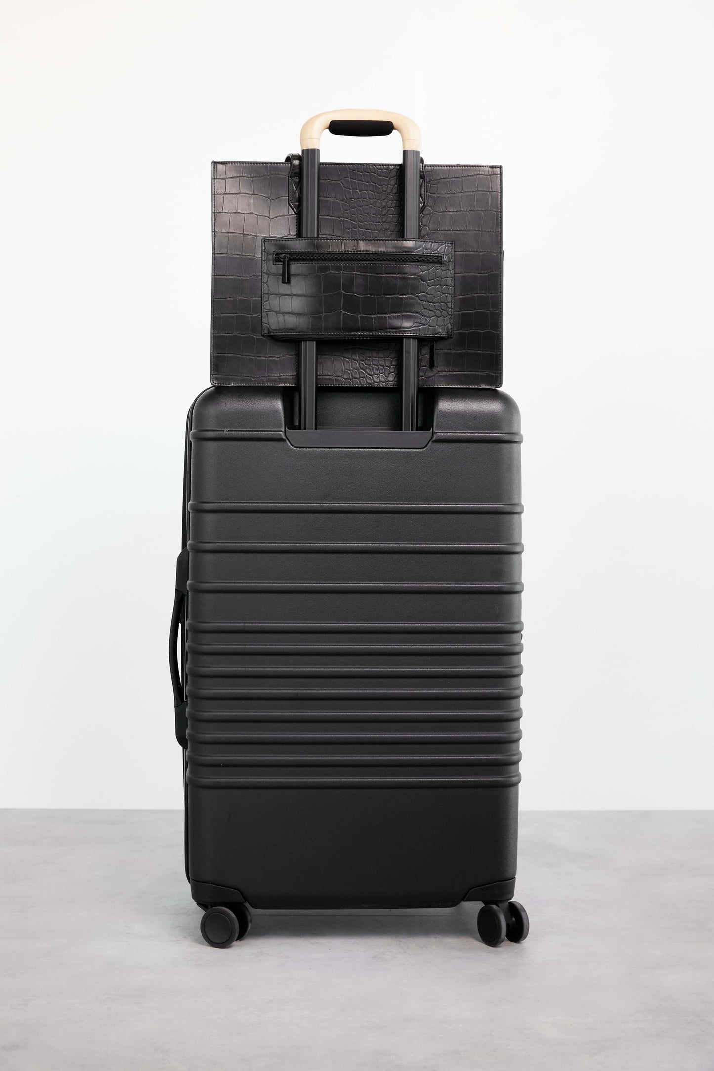Mini Work Tote in Black Croc Back Trolley Sleeve on top of Black Luggage