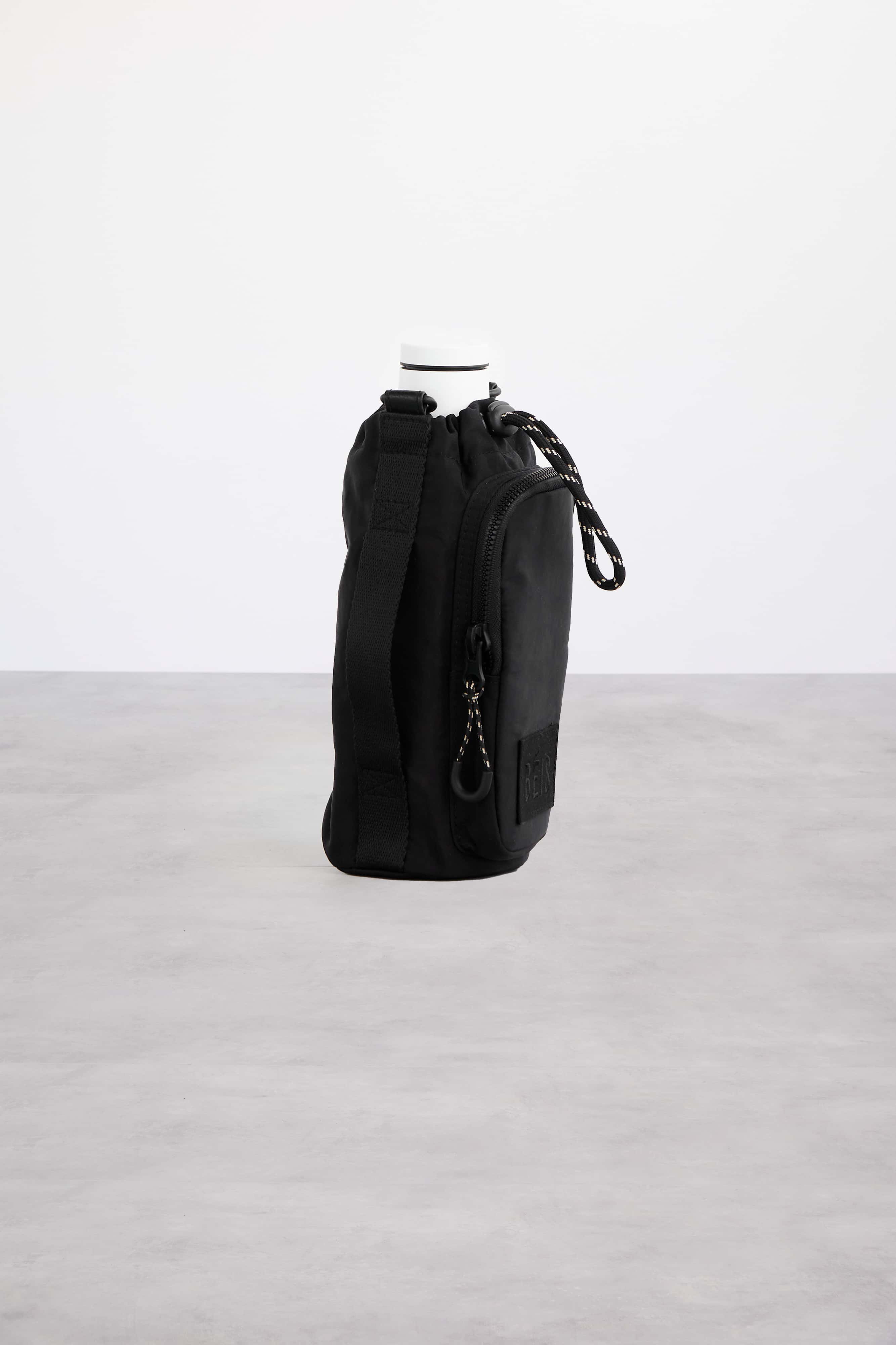 Sling bag with hot sale water bottle holder