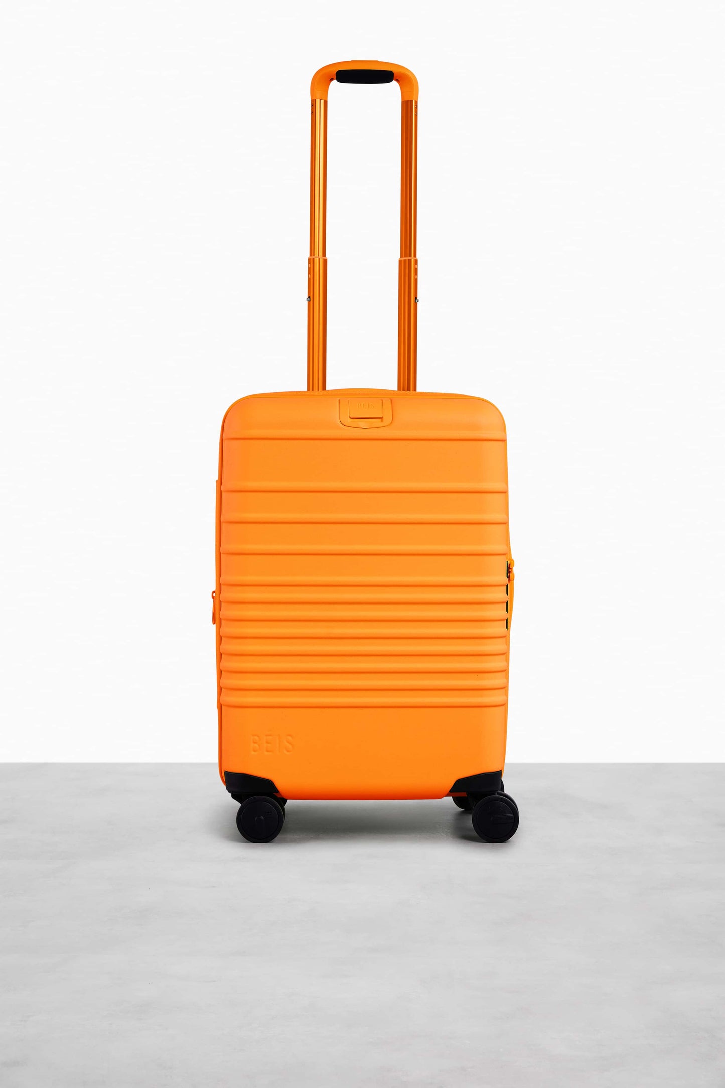The Carry-On Roller in Creamsicle